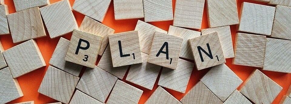 Scrabblesteine gelegt zu "Plan"