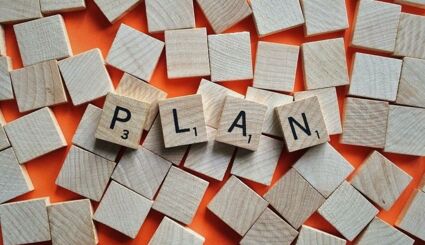 Scrabblesteine gelegt zu "Plan"